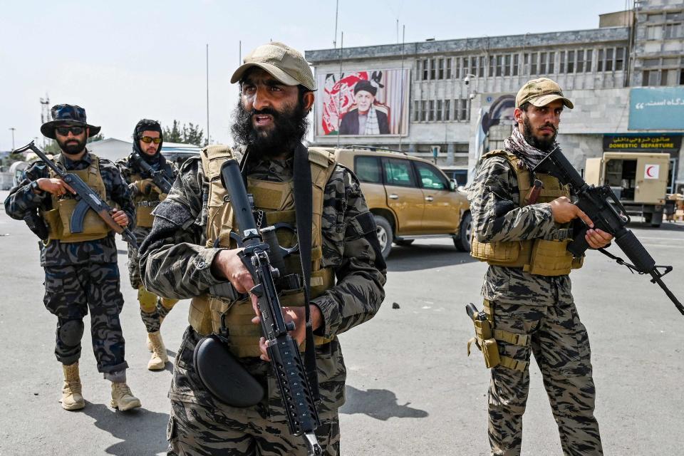 Members of the Taliban Badri 313 military unit arrive at the airport in Kabul on Aug. 31, 2021, after the US has pulled all its troops out of the country to end a brutal 20-year war -- one that started and ended with the hardline Islamist in power.