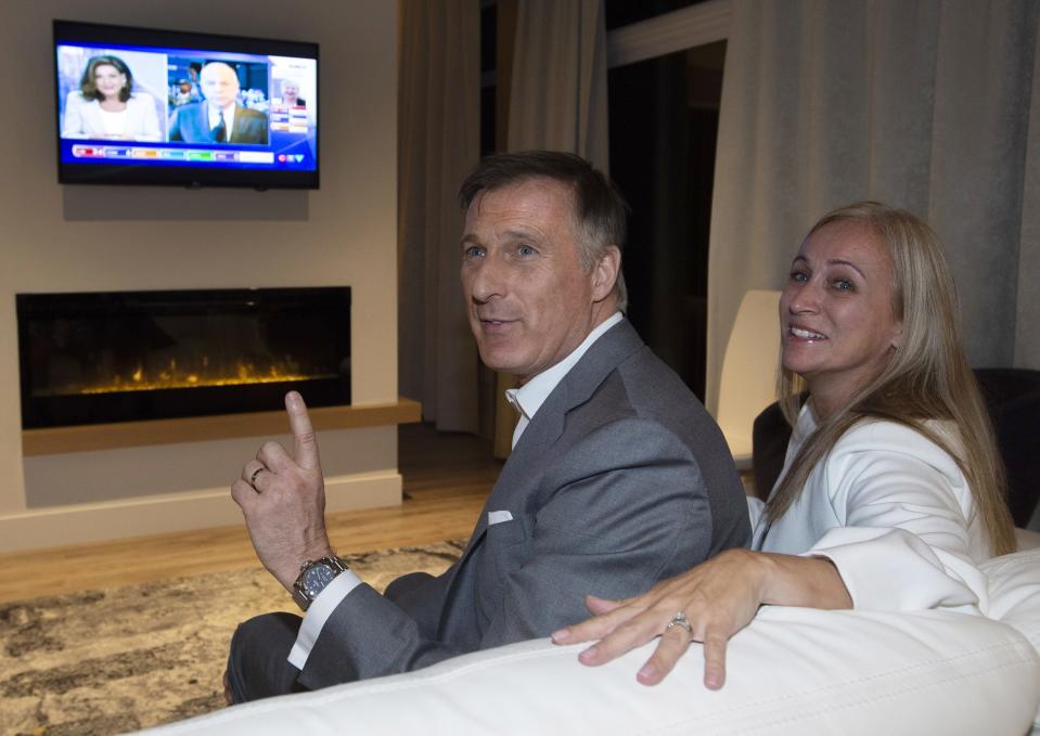 Maxime Bernier and his wife Catherine Letarte watch election results