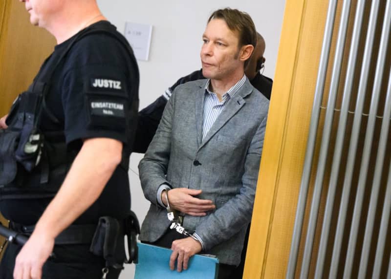 The defendant Christian B. enters the courtroom at Braunschweig Regional Court. In the rape trial in Germany of the Madeleine McCann murder suspect identified under privacy laws as Christian B, doubts have been raised about the accounts of an alleged victim. Julian Stratenschulte/dpa Pool/dpa