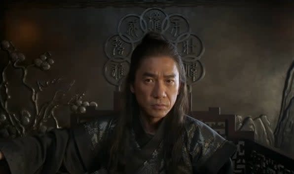 Xu Wenwu sitting on his throne in "Shang-Chi and the Legend of the Ten Rings"