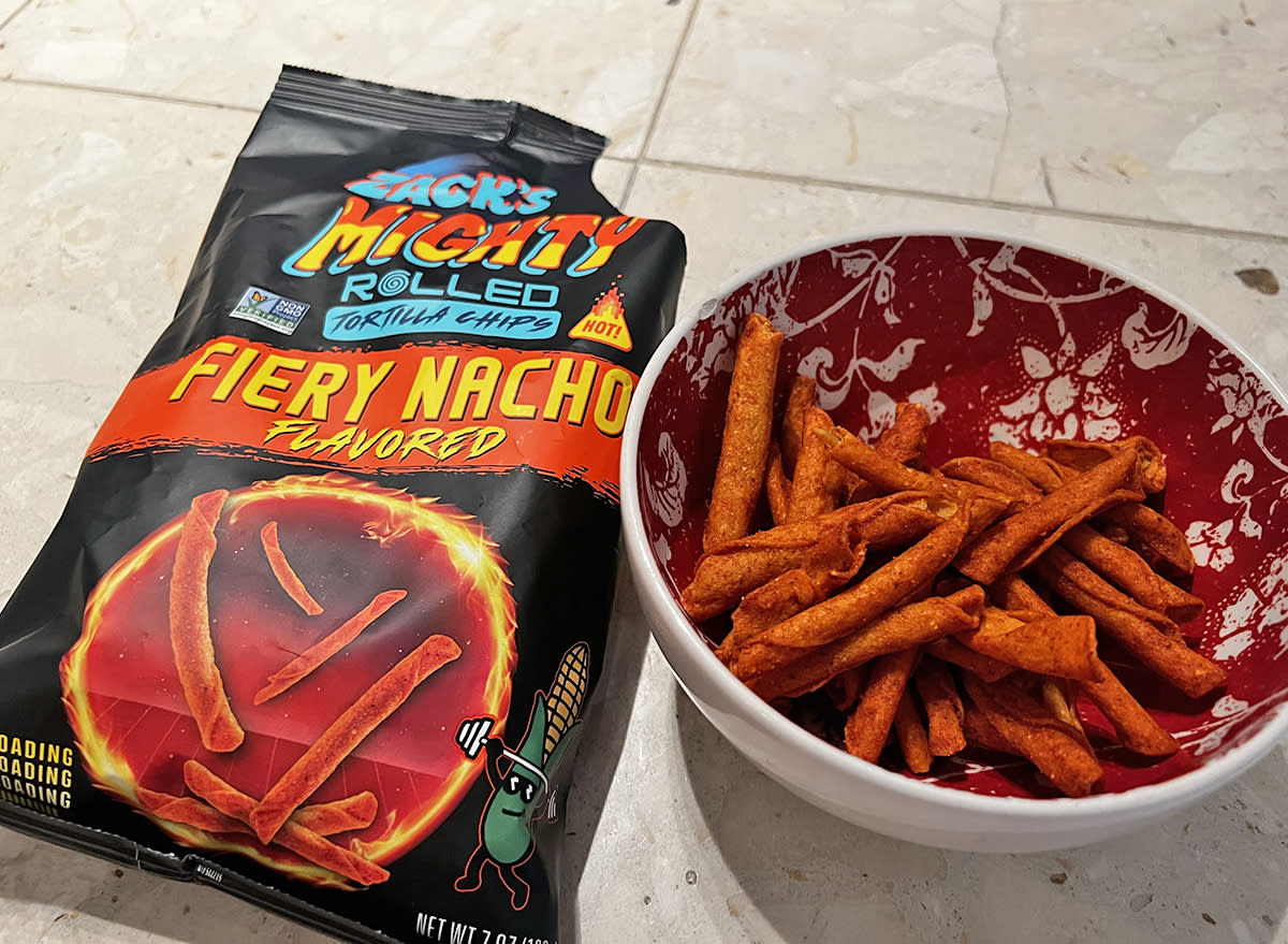 zach's fiery nacho chips in a bag and a bowl.