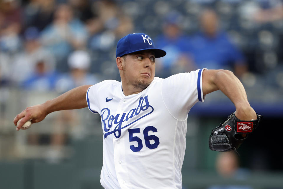 Kansas City Royals pitcher Brad Keller delivers to a Texas Rangers batter during the first inning of a baseball game in Kansas City, Mo., Tuesday, April 18, 2023. (AP Photo/Colin E. Braley)