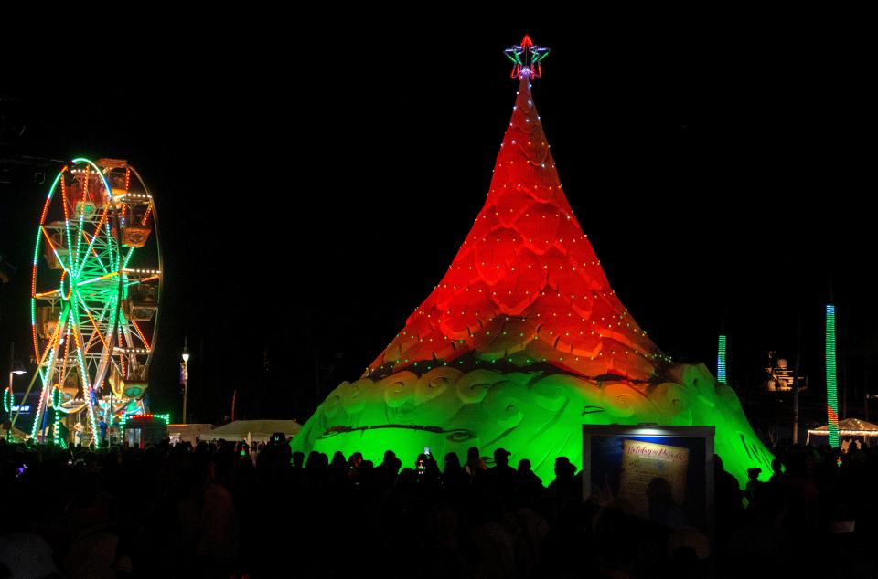 Sandi, the world's only 700-ton holiday sand tree graces West Palm Beach's waterfront annually.