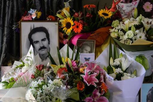 Flowers are placed around portraits at the home of Haji Mohammed Daoud Nabi, 71, the first victim of the Al Noor mosque shooting who was shot dead after welcoming the gunman into the building with the words "Hello brother"