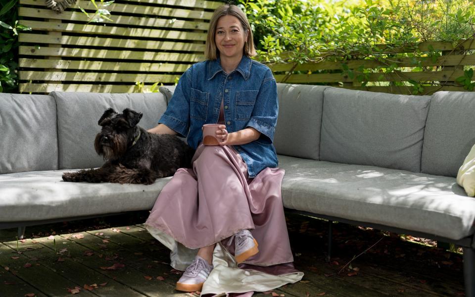 Hannah pairs her wedding dress with a denim jacket and Adidas trainers