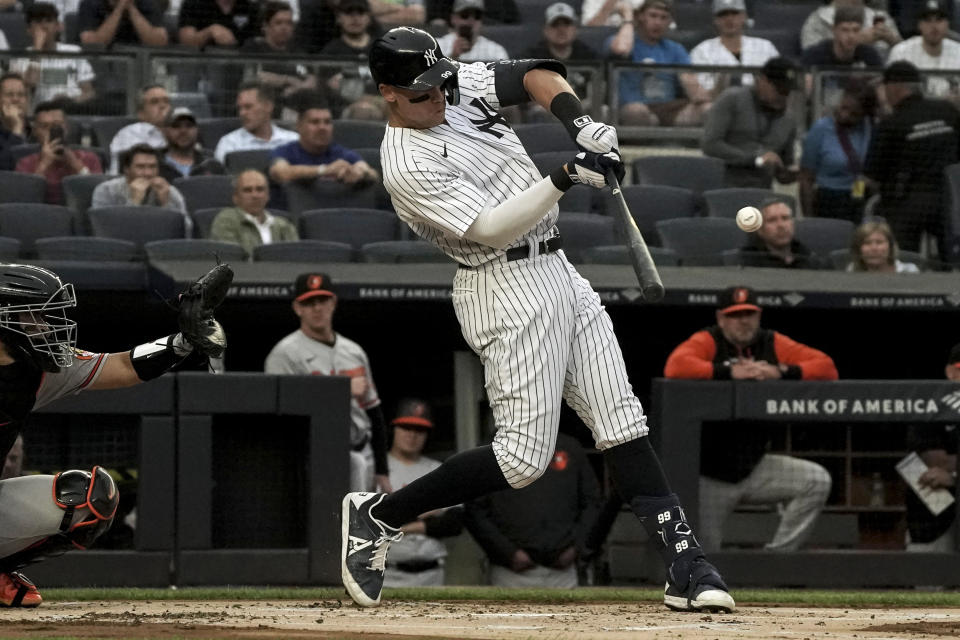 New York Yankees' Aaron Judge hits a home run off Baltimore Orioles starting pitcher Jordan Lyles during the first inning of a baseball game, Monday May 23, 2022, in New York. (AP Photo/Bebeto Matthews)