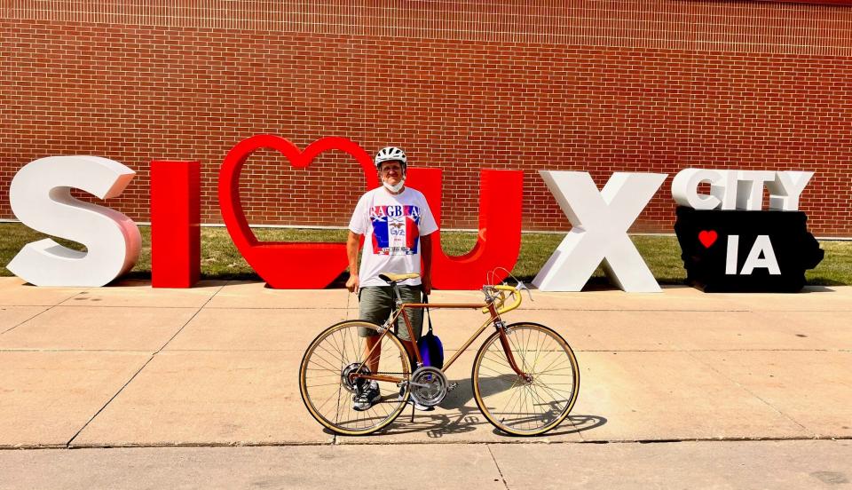 Rick Paulos, left, has ridden parts of all 50 RAGBRAIs.