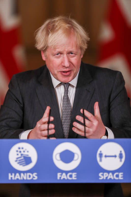 FILE PHOTO: Britain's PM Johnson holds a news conference at Downing Street in London