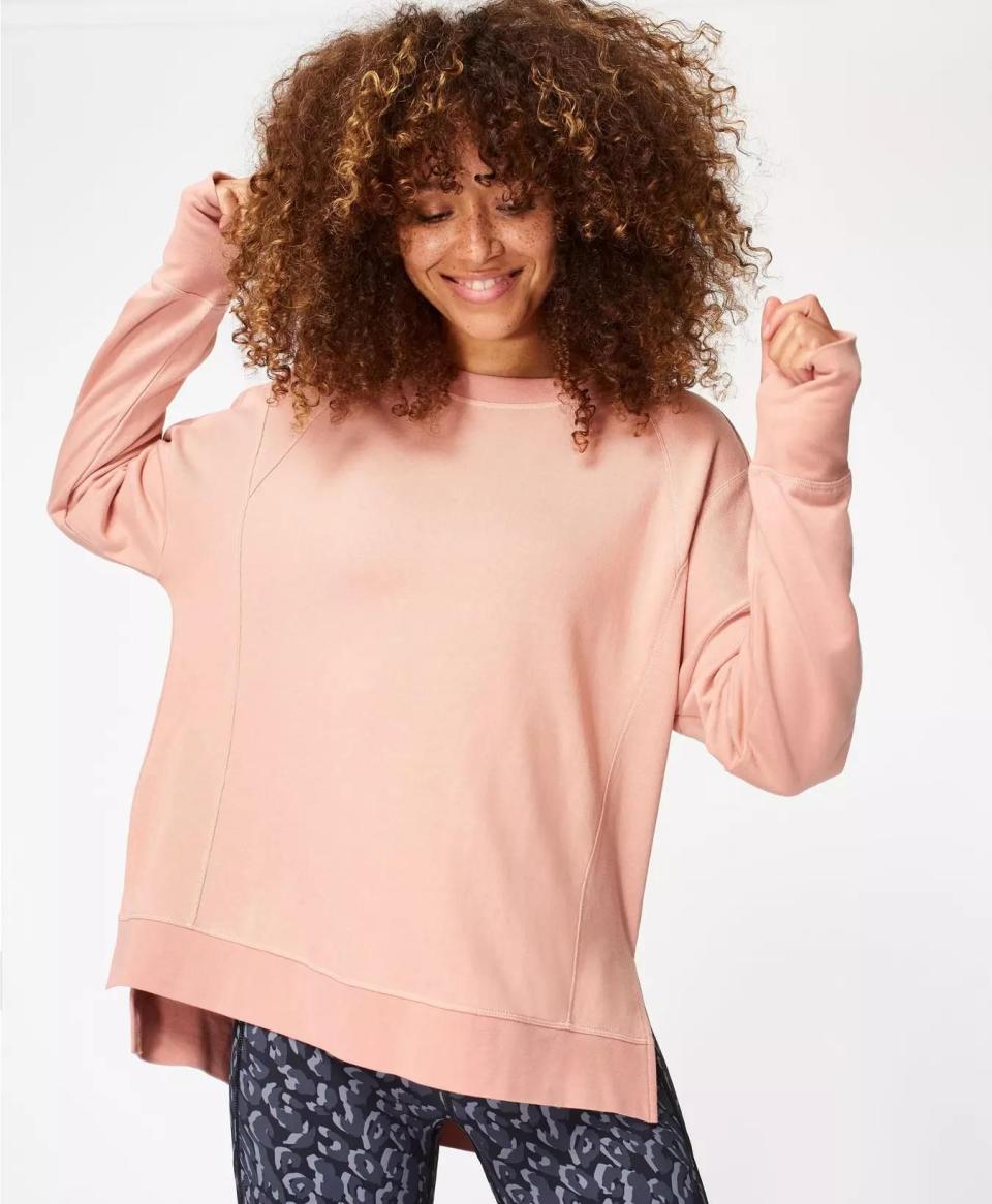 <p><strong>Sweaty Betty</strong></p><p>sweatybetty.com</p><p><a href="https://go.redirectingat.com?id=74968X1596630&url=https%3A%2F%2Fwww.sweatybetty.com%2Fus%2Fshop%2Ftops%2Fsweatshirts-and-hoodies%2Fafter-class-sweatshirt-SB5622_DarkForestGreen.html%3Fdwvar_SB5622__DarkForestGreen_color%3Dmistyrosepink%26tile%3D10.0&sref=https%3A%2F%2Fwww.cosmopolitan.com%2Fstyle-beauty%2Ffashion%2Fg34763775%2Fsweaty-betty-black-friday-2020%2F" rel="nofollow noopener" target="_blank" data-ylk="slk:SHOP NOW;elm:context_link;itc:0;sec:content-canvas" class="link ">SHOP NOW</a></p><p><strong><del>$78</del> $55 (30% off)</strong></p><p>At this price point, this boxy organic cotton pullover is unsurprisingly already selling out fast. Five other colors are still in stock at the time of publication though.</p>