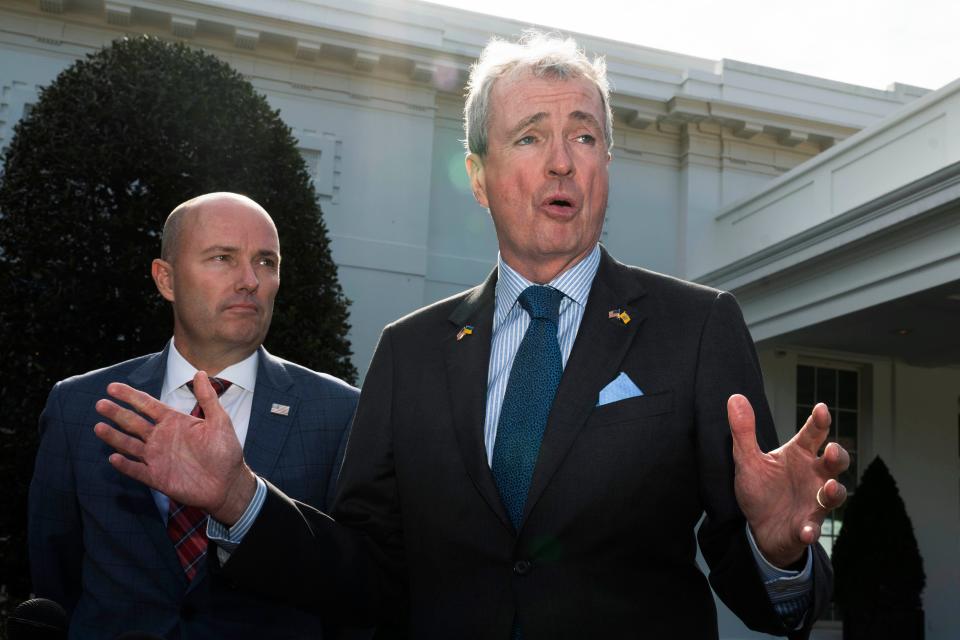 National Governors Association Chair Gov. Phil Murphy of N.J., right, and Vice Chair Gov. Spencer Cox, of Utah, speak to reporters outside the West Wing of the White House in Washington, following a meeting with President Joe Biden and Vice President Kamala Harris, Friday, Feb. 10, 2023.