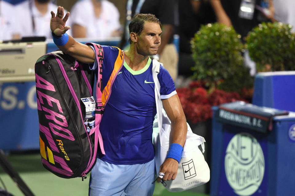 Rafael Nadal (pictured) waves to the crowd after losing a match to Lloyd Harris at the Citi Open.