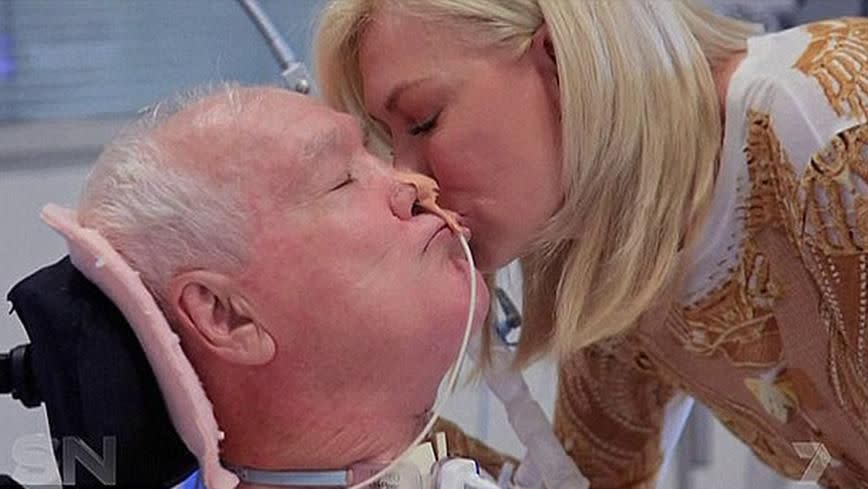 Kerri-Anne gives John a kiss. Source: Sunday Night