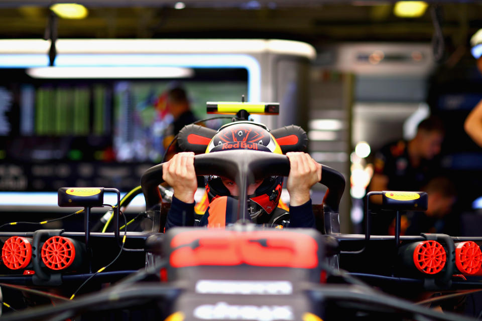 Up and at ’em: Max Verstappen in the Red Bull garage at the Hungaroring