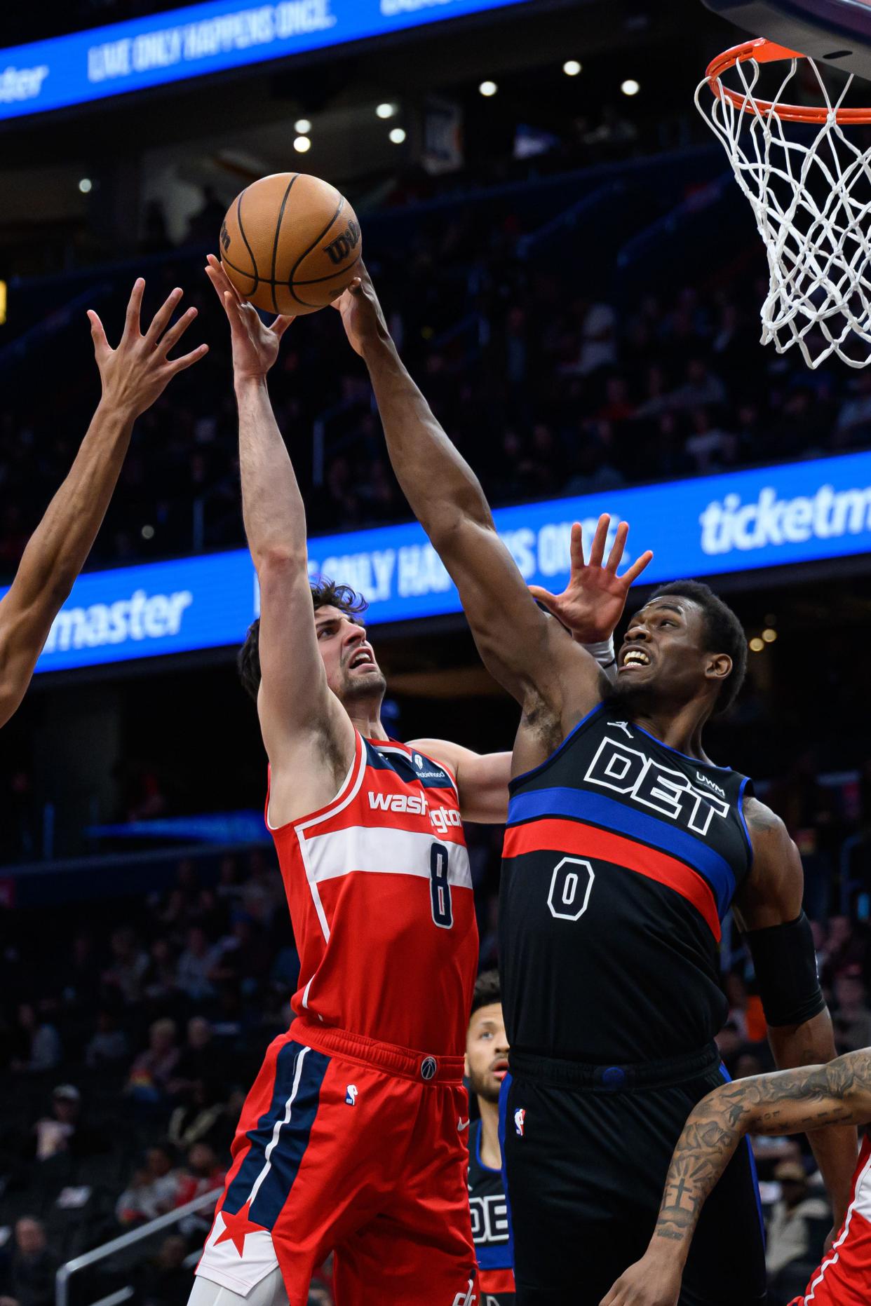 Washington Wizards forward Deni Avdija (8) takes a shot over Detroit Pistons center Jalen Duren (0) during the second quarter at Capital One Arena. Duren played for Memphis coach Penny Hardaway during the 2021-22 season.