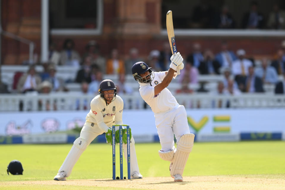 LONDON, ENGLAND - AUGUST 15: Ajinkya Rahane of India hits a delivery from Moeen Ali of England to the boundary during the Second LV= Insurance Test Match: Day Four between England and India at Lord's Cricket Ground on August 15, 2021 in London, England. (Photo by Mike Hewitt/Getty Images)