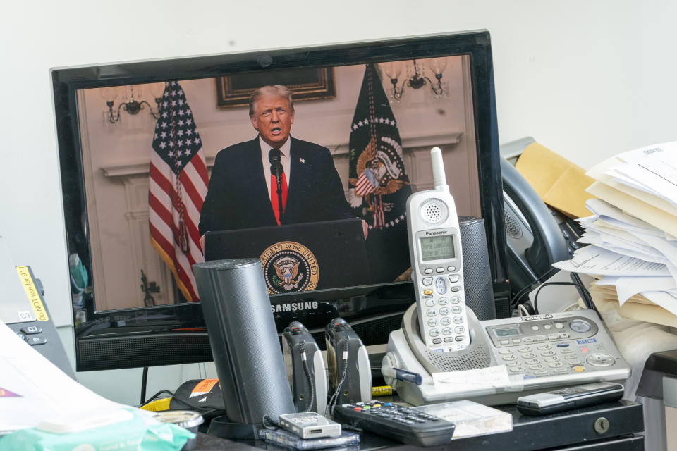 U.S President Donald Trump is seen on a video screen remotely addressing the 75th session of the United Nations General Assembly, Tuesday, Sept. 22, 2020, at U.N. headquarters. This year's annual gathering of world leaders at U.N. headquarters will be almost entirely "virtual." Leaders have been asked to pre-record their speeches, which will be shown in the General Assembly chamber, where each of the 193 U.N. member nations are allowed to have one diplomat present. (AP Photo/Mary Altaffer)