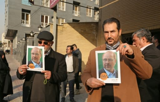 Campaigning for Friday's parliamentary election in Iran has been low-key with posters but few rallies