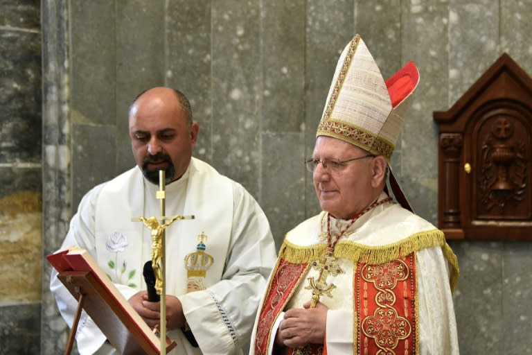 Around 300 faithful attended mass in the church of Um al-Mauna -- 'Our Lady of Perpetual Help' (Zaid AL-OBEIDI)