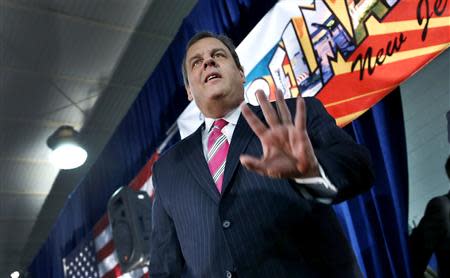 New Jersey Governor Chris Christie arrives to speak to local residents of Belmar, New Jersey, and other shore towns in Monmouth County during a town hall meeting to discuss federal funds for recovery from hurricane Sandy, in Belmar, March 25, 2014. REUTERS/Mike Segar