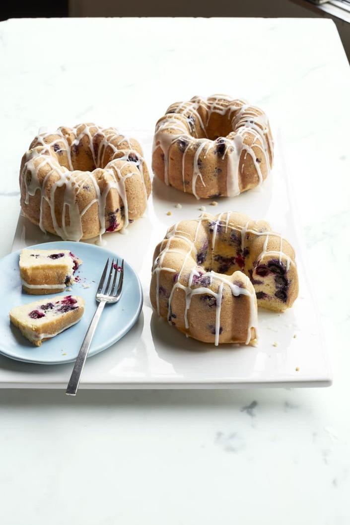 <p>Everyone at your Mother's Day brunch will love having their own mini bundt cake.</p><p>Get the <strong><a href="https://www.womansday.com/food-recipes/food-drinks/recipes/a50261/mini-lemon-blueberry-bundt-cakes-recipe-wdy0515/" rel="nofollow noopener" target="_blank" data-ylk="slk:Mini Lemon-Blueberry Bundt Cakes recipe" class="link ">Mini Lemon-Blueberry Bundt Cakes recipe</a></strong><strong>.</strong></p>