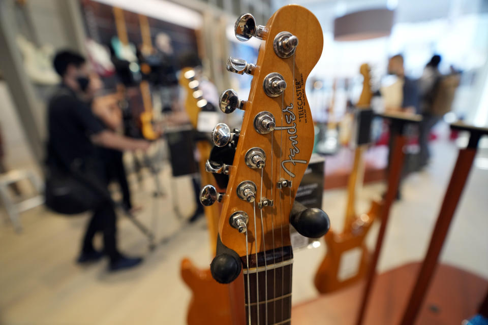 Fender guitars are on display at the opening ceremony of its Tokyo store Thursday, June 29, 2023. Fender, the guitar of choice for some of the world’s biggest stars from Jimi Hendrix to Eric Clapton, is opening what it calls its “first flagship store” in its 77-year history. (AP Photo/Eugene Hoshiko)