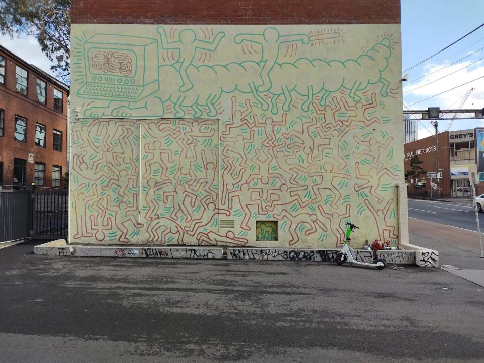 This 1984 mural by New York artist Keith Haring is on the Victorian Heritage Register. A sign has been erected (below) to explain its significance. Sabina Andron