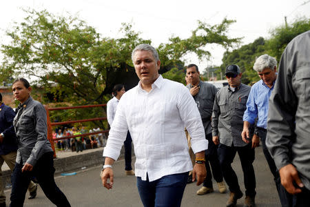 Colombia's President Ivan Duque visits the Francisco de Paula Santander cross-border bridge between Colombia and Venezuela in Cucuta, Colombia February 24, 2019. REUTERS/Edgard Garrido