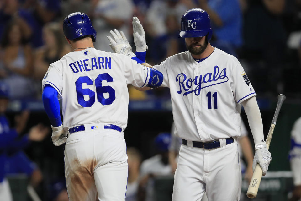 Kansas City Royals Ryan O'Hearn (66) is congratulated by Bubba Starling (11) after his solo home run during the sixth inning of the team's baseball game against the Oakland Athletics at Kauffman Stadium in Kansas City, Mo., Wednesday, Aug. 28, 2019. (AP Photo/Orlin Wagner)