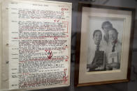 Writing notes and a framed photograph from author and biographer Robert Caro appears during a tour of a permanent exhibit in his honor, "Turn Every Page": Inside the Robert A. Caro Archive, at the New York Historical Society Museum & Library in New York on Wednesday, Oct. 20, 2021. (AP Photo/John Minchillo)