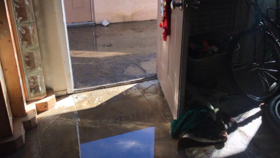 Tim Leaper's apartment remains flooded after a water main broke in Desert Hot Springs early Sunday morning.