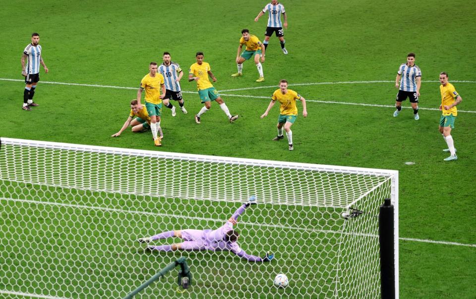 Lionel Messi of Argentina scores the team's first goal during the FIFA World Cup Qatar 2022 Round of 16 match between Argentina and Australia at Ahmad Bin Ali Stadium - FIFA