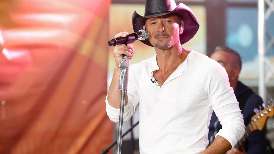 Tim McGraw performing on stage