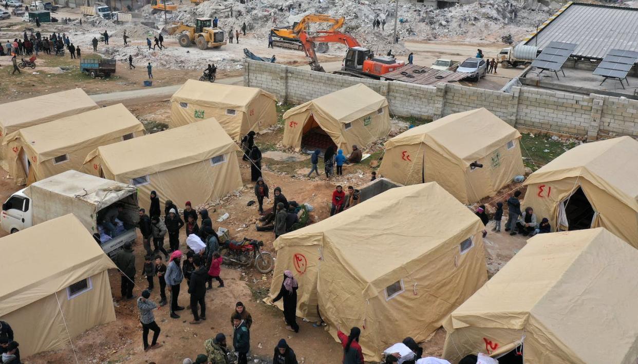 Temporary shelters have been set up near neighborhoods in the Idlib province demolished by the Syria-Turkey earthquake. <a href="https://www.gettyimages.com/detail/news-photo/magnitude-quake-struck-early-on-february-6-as-people-slept-news-photo/1247017652?phrase=syria%20earthquake%20Idlib%20province&adppopup=true" rel="nofollow noopener" target="_blank" data-ylk="slk:Omar Haj Kadour/ AFP via Getty Images;elm:context_link;itc:0;sec:content-canvas" class="link ">Omar Haj Kadour/ AFP via Getty Images</a>