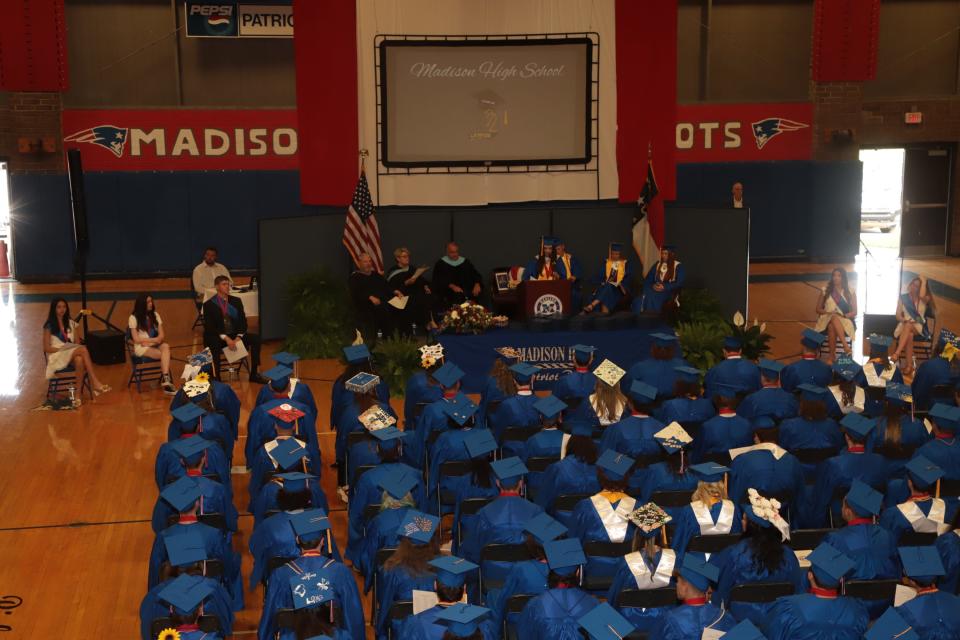 The legacy of David Robinson, the former Madison High School principal who suffered an aneurysm and died in January, was honored by students and teachers during the school's May 21 graduation ceremony.