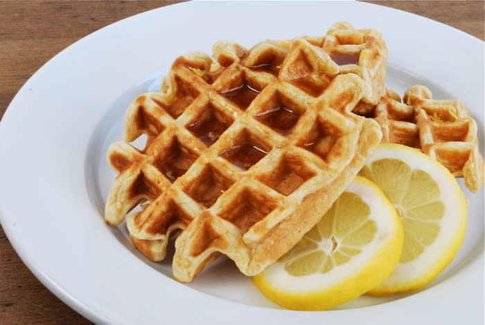 <div class="caption-credit"> Photo by: Family Kitchen</div><div class="caption-title">Whole Grain Waffles</div>Why not have waffles for lunch? Make them with whole grains so they're relatively healthy, and add a host of fresh fruits and an easy protein like yogurt, and you're set. <br> <i><a rel="nofollow noopener" href="http://blogs.babble.com/family-kitchen/2011/05/21/whole-wheat-lemon-yogurt-waffles/" target="_blank" data-ylk="slk:Make whole wheat lemon yogurt waffles;elm:context_link;itc:0;sec:content-canvas" class="link ">Make whole wheat lemon yogurt waffles</a></i> <br>