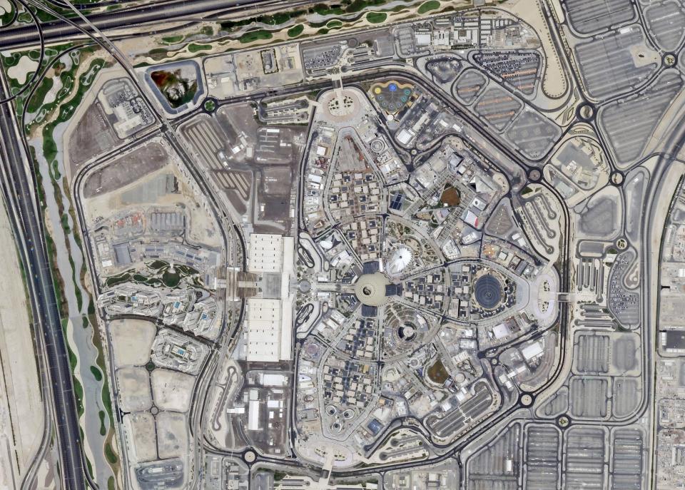 In this Aug. 8, 2021 satellite photo taken by Planet Labs Inc., the site of Expo 2020 is seen in Dubai, United Arab Emirates. Delayed a year over the coronavirus pandemic, Dubai's Expo 2020 opens this Friday. It will put this city-state all-in on its bet of billions of dollars that the world's fair will boost its economy. (Planet Labs Inc. via AP)
