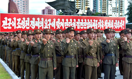 Servicepersons of the Ministry of People's Security met on August 10, 2017 to express full support for the Democratic People's Republic of Korea (DPRK) government statement, in this photo released on August 11, 2017 by North Korea's Korean Central News Agency (KCNA) in Pyongyang. KCNA/via REUTERS