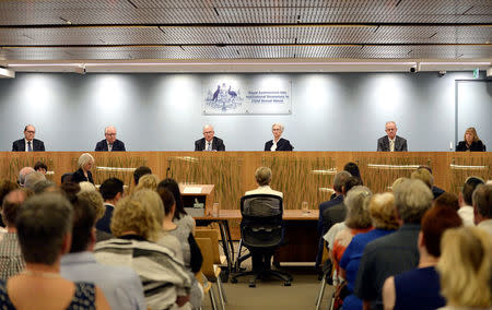 Commissioner Andrew Murray, Commissioner Robert Fitzgerald, Justice Peter McClellan, Justice Jennifer Coates, Commissioner Bob Atkinson and Commissioner Helen Milroy at the final sitting of the Royal Commission into Institutional Responses to Child Sexual Abuse in Sydney, Australia, December 14, 2017. Royal Commission into Institutional Responses to Child Sexual Abuse/Handout via REUTERS