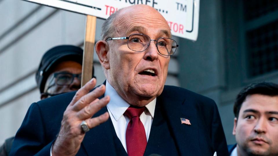 PHOTO: Rudy Giuliani speaks during a news conference outside the federal courthouse in Washington, Dec. 15, 2023.  (Jose Luis Magana/AP)