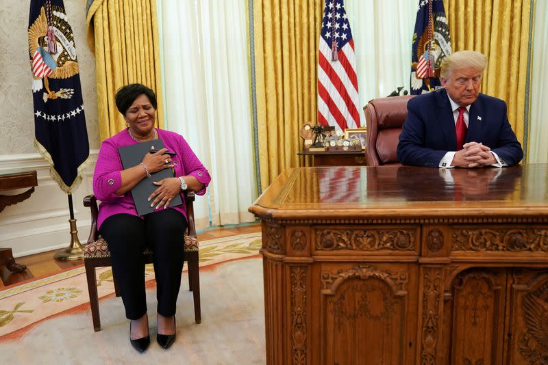 Trump pardons Alice Johnson at the White House in Washington