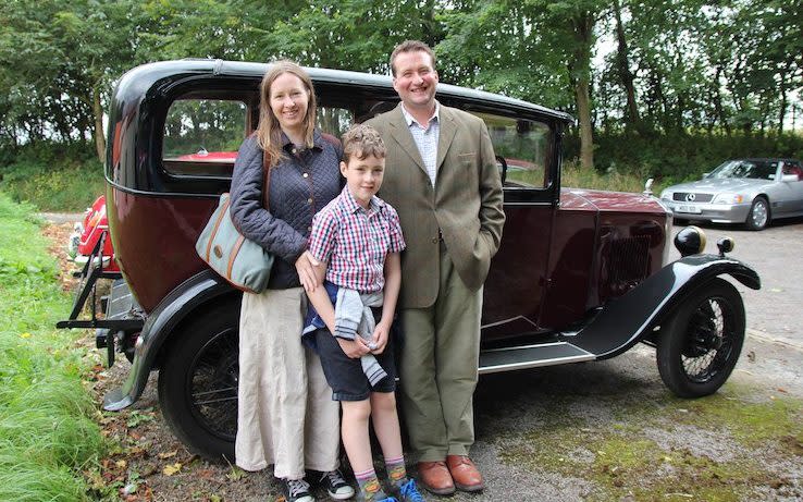 Robin Wills, right, with his wife Anna, left, and son Harry, 9, was able to track down Mr Davidson - Credit: Robin Wills