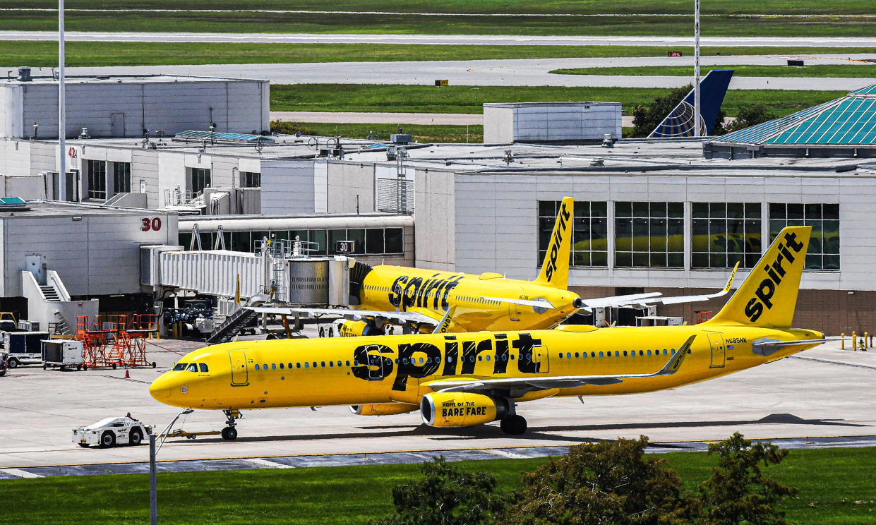 ORLANDO, FLORIDA, UNITED STATES - 2021/08/06: A Spirit Airlines aircraft is towed from the terminal gate at Orlando International Airport on the sixth day the airline has cancelled hundreds of flights. 
Approximately 2,000 flights were cancelled this week due to weather, staffing shortages, computer problems, and passenger volume. (Photo by Paul Hennessy/SOPA Images/LightRocket via Getty Images)
