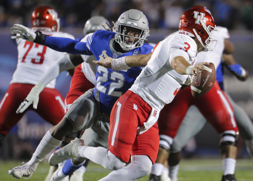 Memphis lineman Jaylon Allen (22) flushes out Houston quarterback Clayton Tune (3) during an NCAA college football game Friday, Oct. 7, 2022, in Memphis, Tenn. (Patrick Lantrip/Daily Memphian via AP)