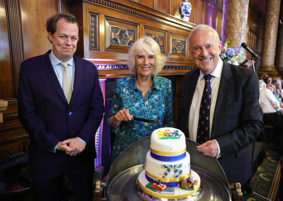 LONDON, ENGLAND - JULY 12: (L-R) Tom Parker Bowles, Camilla, Duchess of Cornwall and Gyles Brandreth during The Oldie Luncheon, in celebration of her 75th Birthday at National Liberal Club on July 12, 2022 in London, England. (Photo by Chris Jackson/Getty Images)