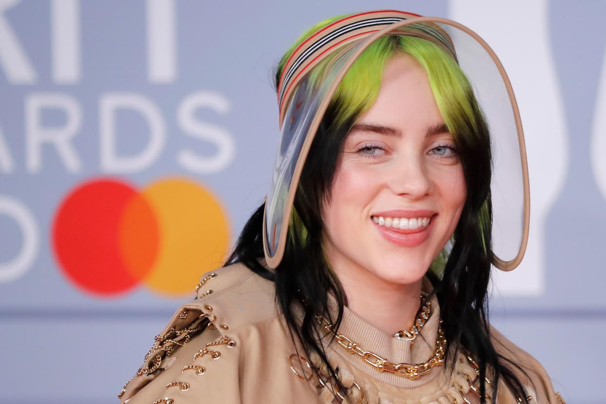 US singer-songwriter Billie Eilish poses on the red carpet on arrival for the BRIT Awards 2020 in London on February 18, 2020. (Photo by Tolga AKMEN / AFP) / RESTRICTED TO EDITORIAL USE  NO POSTERS  NO MERCHANDISE NO USE IN PUBLICATIONS DEVOTED TO ARTISTS (Photo by TOLGA AKMEN/AFP via Getty Images)