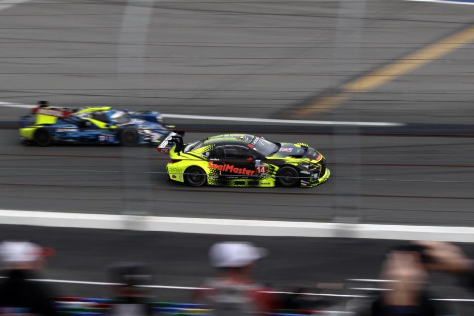 a lexus rc gtd car going into turn 1