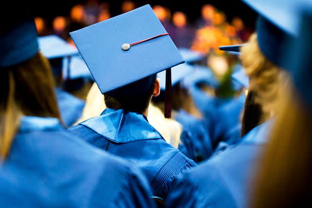 <p>Getty</p> A stock image of a graduate during a graduation ceremony.