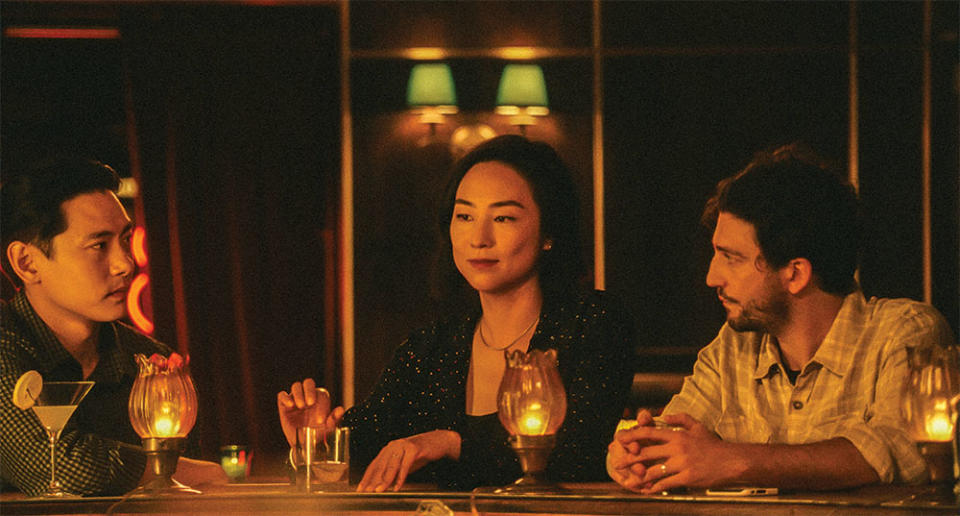 From left: Yoo, Lee and Magaro in the movie’s opening scene, at a New York bar.