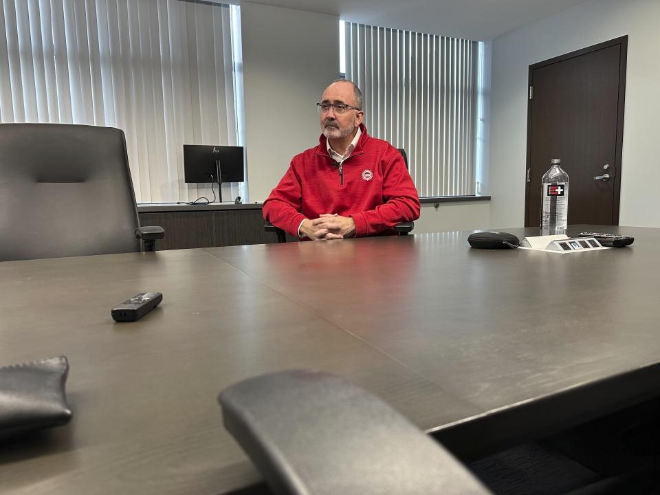 United Auto Workers President Shawn Fain speaks to a reporter from The Associated Press during an interview at the union's headquarters Monday, Nov. 20, 2023, in Detroit. (AP Photo/Mike Householder)