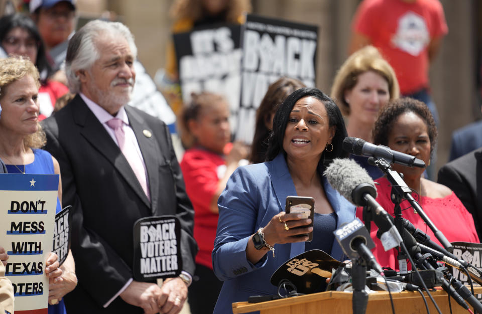 Rep. Nicole Collier, D-Fort Worth, stands with other Democratic caucus members as she speaks at a rally on the steps of the Texas Capitol to support voting rights, Thursday, July 8, 2021, in Austin, Texas. (AP Photo/Eric Gay)